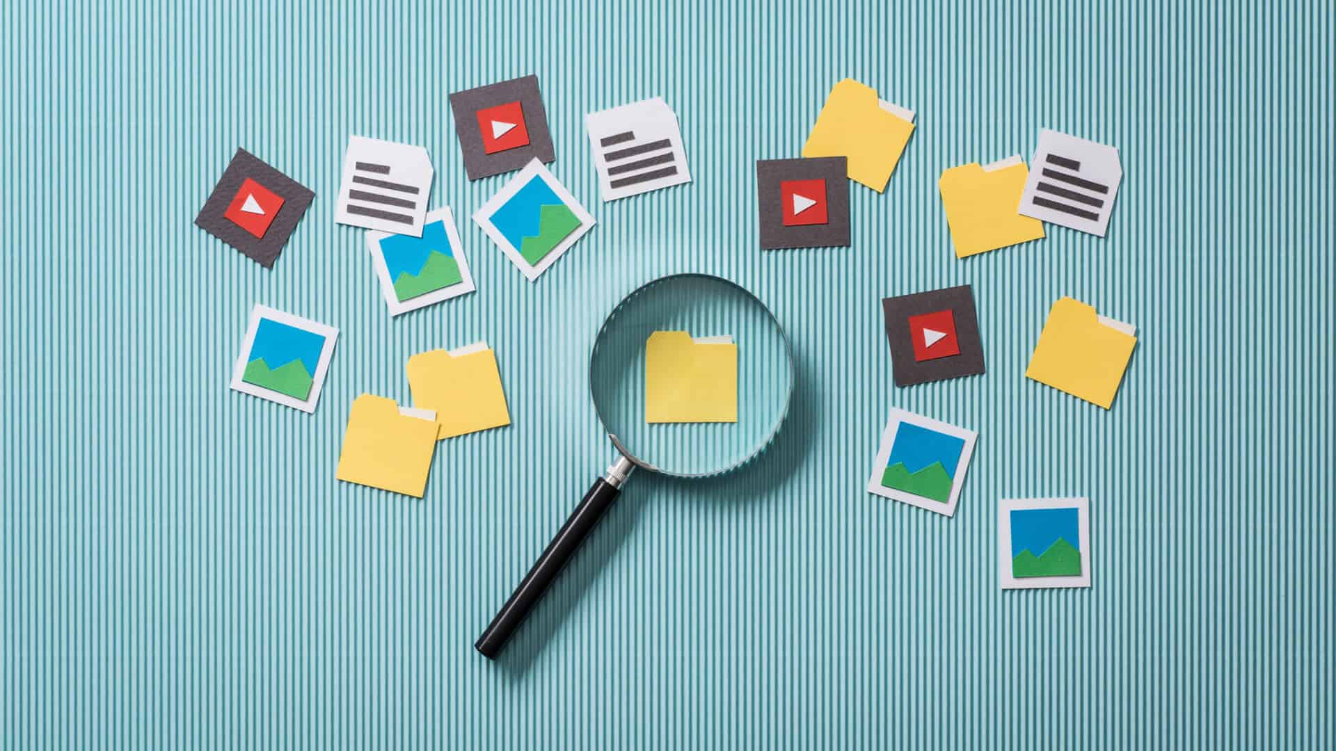 searching for Google Ads Inspiration with magnifying glass file searching with magnifying glass
